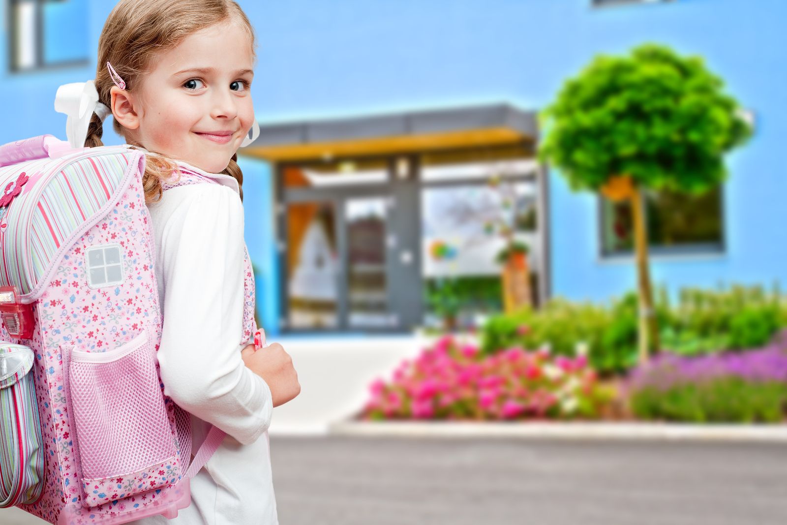 Back to school – lovely schoolgirl on the way to the school NovoaGlobal School Zone Speed Safe